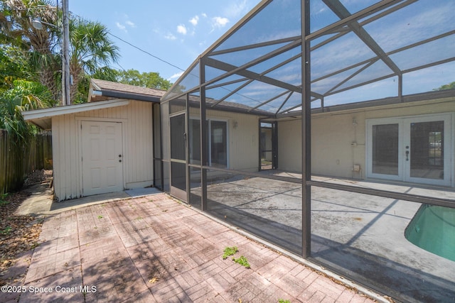 315 Cherry Ave, Merritt Island, FL 32953 - rear view of property with a patio, a lanai, and french doors