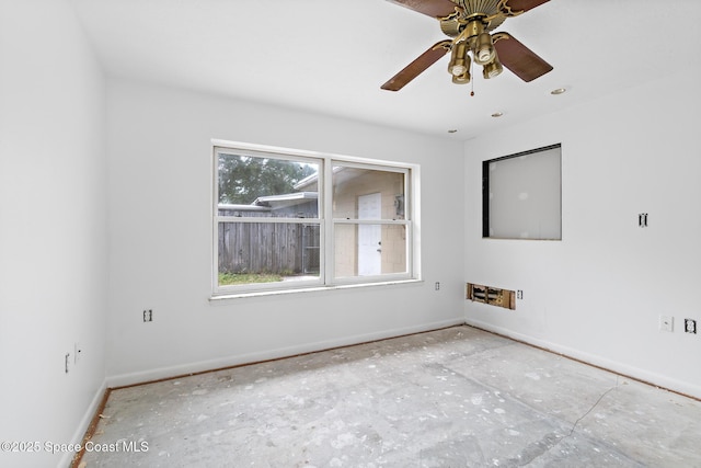315 Cherry Ave, Merritt Island, FL 32953 - empty room featuring baseboards and a ceiling fan