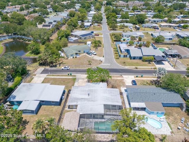 315 Cherry Ave, Merritt Island, FL 32953 - aerial view of residential area with a pool and a large body of water