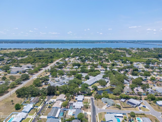 315 Cherry Ave, Merritt Island, FL 32953 - aerial perspective of suburban area with a nearby body of water