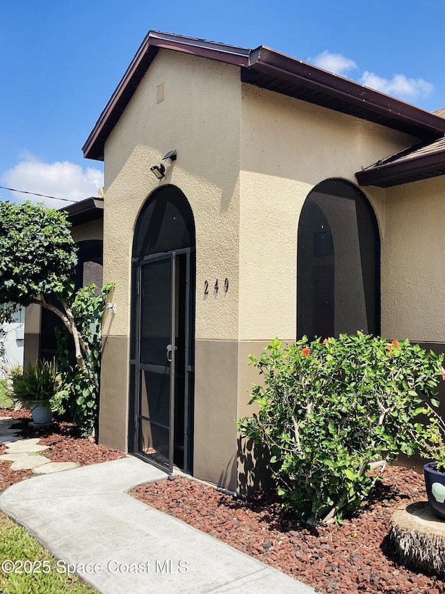 249 Franzing St, Palm Bay, FL 32908 - property entrance with stucco siding