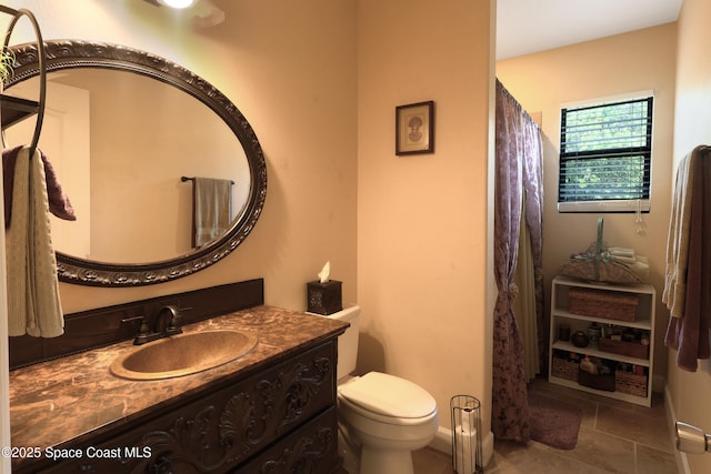 249 Franzing St, Palm Bay, FL 32908 - full bathroom featuring toilet, vanity, a shower with curtain, and tile patterned flooring