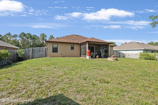 249 Franzing St, Palm Bay, FL 32908 - back of property featuring a sunroom and stucco siding