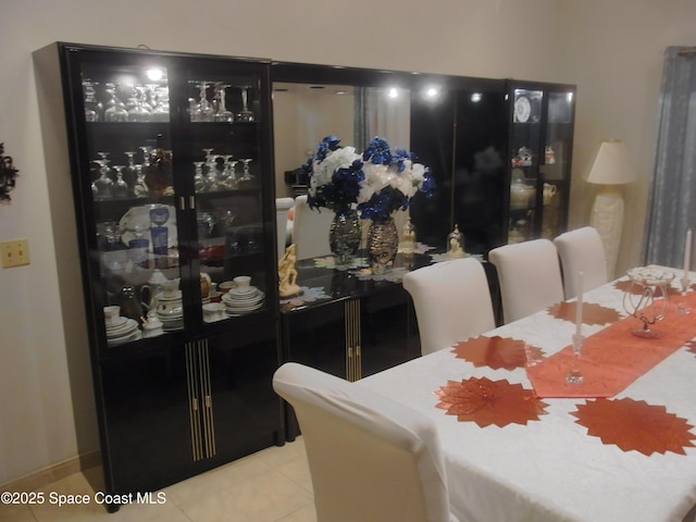 1412 Napanee St NW, Palm Bay, FL 32907 - dining area with tile patterned flooring