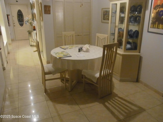 1412 Napanee St NW, Palm Bay, FL 32907 - dining room featuring baseboards and light tile patterned floors
