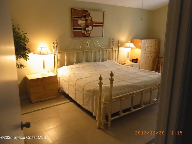 1412 Napanee St NW, Palm Bay, FL 32907 - bedroom with tile patterned flooring