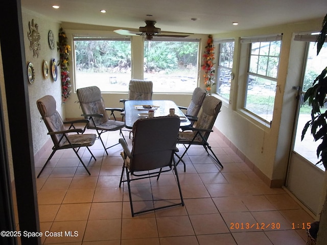 1412 Napanee St NW, Palm Bay, FL 32907 - dining area featuring a ceiling fan, recessed lighting, and plenty of natural light