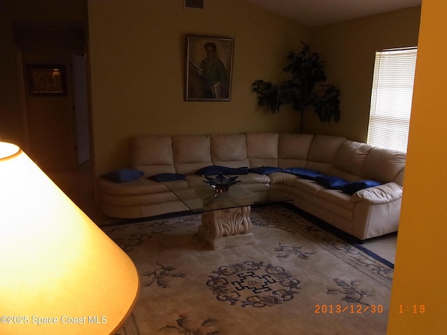 1412 Napanee St NW, Palm Bay, FL 32907 - living room featuring vaulted ceiling and visible vents