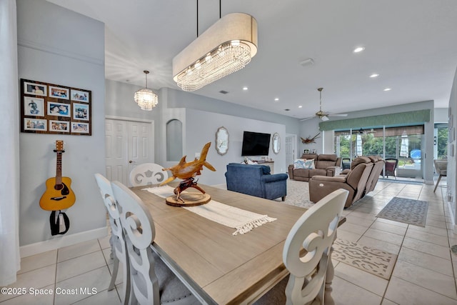 4220 Savannahs Trl, Merritt Island, FL 32953 - dining space featuring a chandelier, light tile patterned floors, recessed lighting, baseboards, and ceiling fan