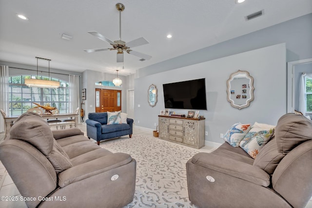 4220 Savannahs Trl, Merritt Island, FL 32953 - living room with plenty of natural light, recessed lighting, ceiling fan, and baseboards