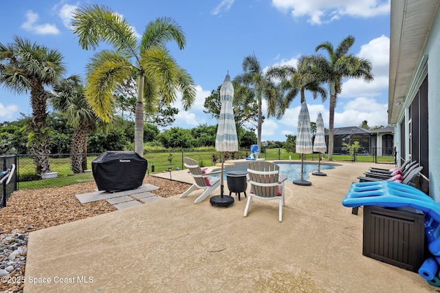 4220 Savannahs Trl, Merritt Island, FL 32953 - view of patio / terrace with fence and a grill