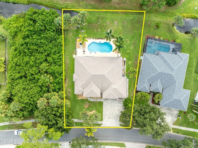4220 Savannahs Trl, Merritt Island, FL 32953 - aerial view of property and surrounding area featuring a pool and property boundaries highlighted