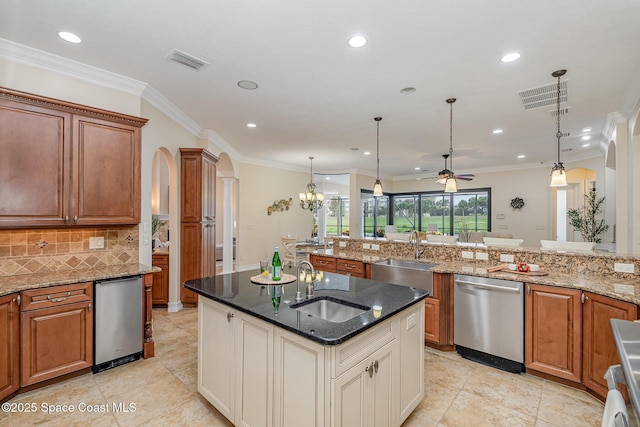 7346 Gorda Peak Ct, Melbourne, FL 32940 - kitchen with dishwasher, a sink, arched walkways, ceiling fan, and recessed lighting