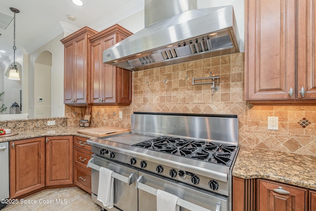 7346 Gorda Peak Ct, Melbourne, FL 32940 - kitchen featuring stainless steel appliances, wall chimney range hood, crown molding, and brown cabinetry