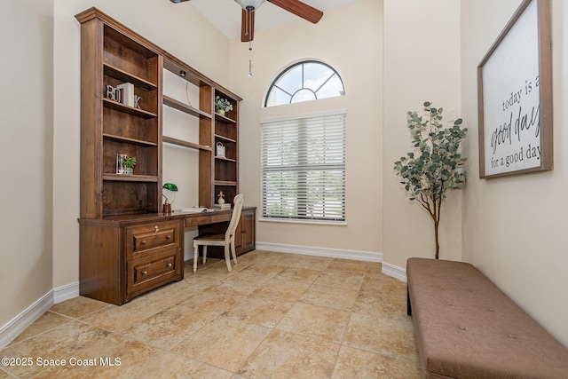 7346 Gorda Peak Ct, Melbourne, FL 32940 - office featuring ceiling fan, built in desk, plenty of natural light, and baseboards