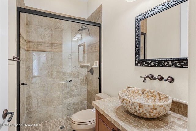 7346 Gorda Peak Ct, Melbourne, FL 32940 - full bathroom featuring a shower stall, toilet, and vanity