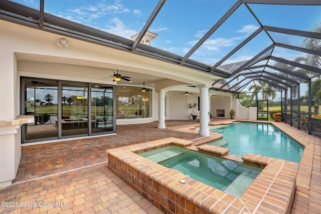 7346 Gorda Peak Ct, Melbourne, FL 32940 - view of pool with a patio, ceiling fan, a pool with connected hot tub, and glass enclosure