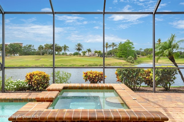 7346 Gorda Peak Ct, Melbourne, FL 32940 - view of swimming pool featuring view of golf course, glass enclosure, a water view, and an in-ground hot tub
