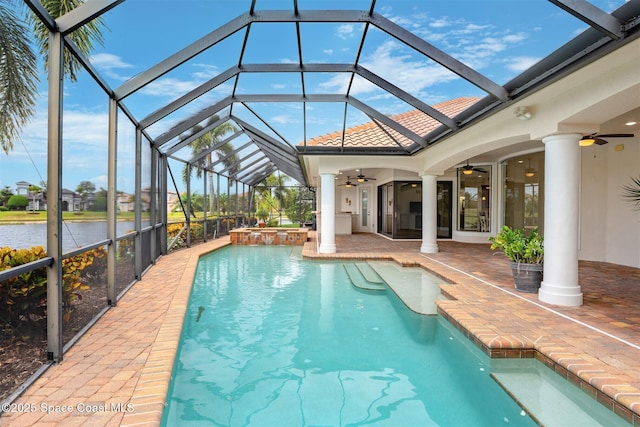 7346 Gorda Peak Ct, Melbourne, FL 32940 - view of pool with a ceiling fan, a patio area, a water view, and glass enclosure