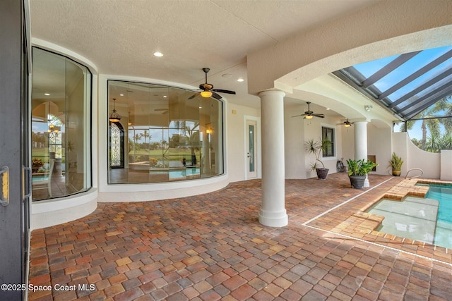7346 Gorda Peak Ct, Melbourne, FL 32940 - view of patio / terrace featuring a ceiling fan, glass enclosure, and an outdoor pool