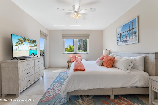 bedroom featuring light tile patterned floors and ceiling fan