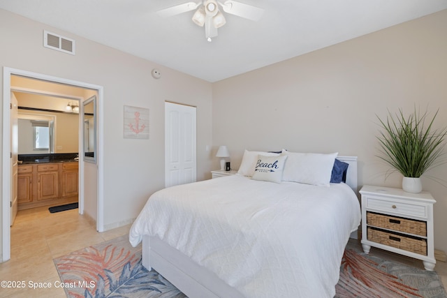 bedroom with a ceiling fan, a closet, light tile patterned floors, baseboards, and visible vents