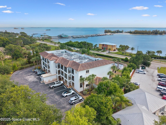drone / aerial view with a water view