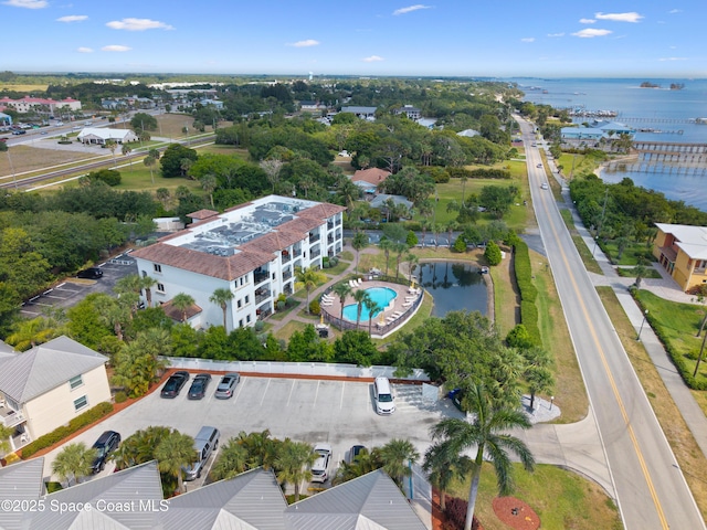 birds eye view of property featuring a water view