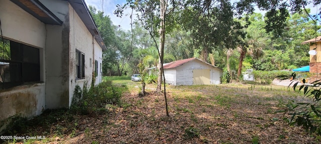 920 Malabar Rd, Malabar, FL 32950 - view of yard featuring a shed and an outdoor structure