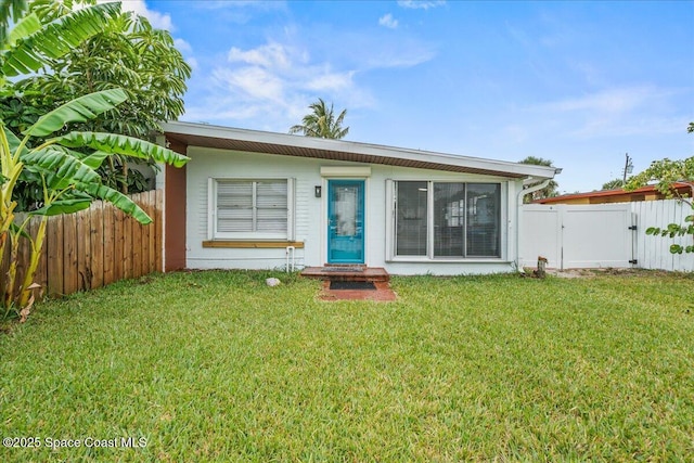 215 Jefferson Ave, Cape Canaveral, FL 32920 - view of front of house with a gate