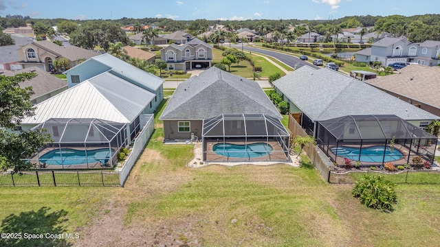 730 Sunset Lakes Dr, Merritt Island, FL 32953 - aerial view of residential area with a pool
