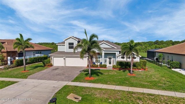7268 Preserve Pointe Dr, Merritt Island, FL 32953 - view of front facade with driveway and a garage