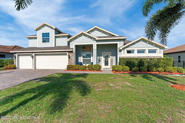 7268 Preserve Pointe Dr, Merritt Island, FL 32953 - view of front of house with stucco siding, decorative driveway, a garage, and stone siding