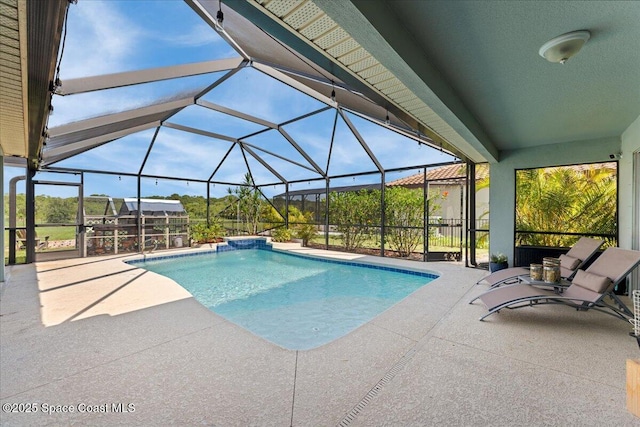 7268 Preserve Pointe Dr, Merritt Island, FL 32953 - outdoor pool featuring a patio area and glass enclosure