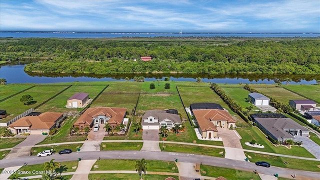 7268 Preserve Pointe Dr, Merritt Island, FL 32953 - aerial overview of property's location with a nearby body of water, nearby suburban area, and a forest