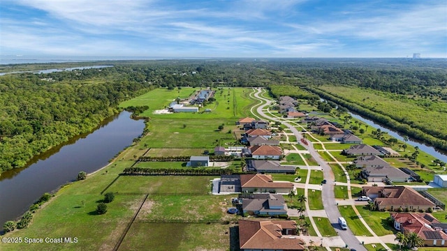 7268 Preserve Pointe Dr, Merritt Island, FL 32953 - drone / aerial view of a heavily wooded area and a nearby body of water