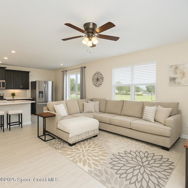 735 Sorrento Dr, Cocoa, FL 32922 - living room featuring a ceiling fan and recessed lighting