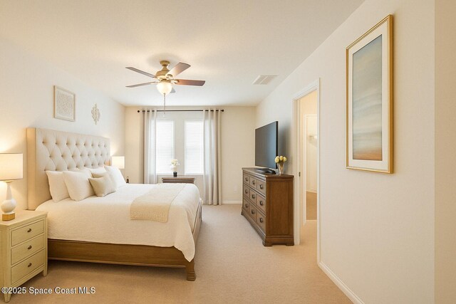735 Sorrento Dr, Cocoa, FL 32922 - bedroom featuring light carpet, baseboards, and ceiling fan