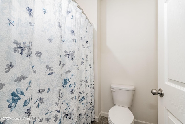 735 Sorrento Dr, Cocoa, FL 32922 - full bath with baseboards, toilet, and a shower with shower curtain