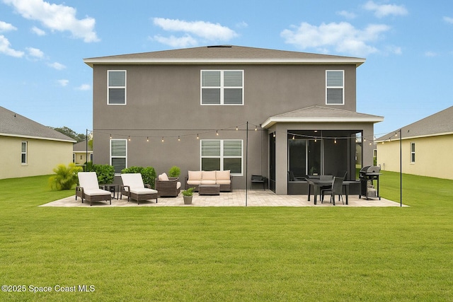 735 Sorrento Dr, Cocoa, FL 32922 - rear view of property featuring an outdoor living space, a patio area, a lawn, and stucco siding