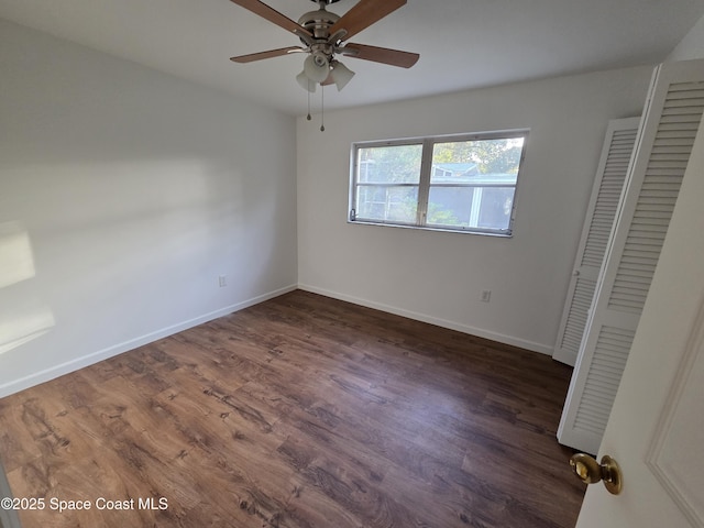 55 S Grandview Cir, Cocoa, FL 32922 - unfurnished bedroom with wood finished floors, ceiling fan, and a closet