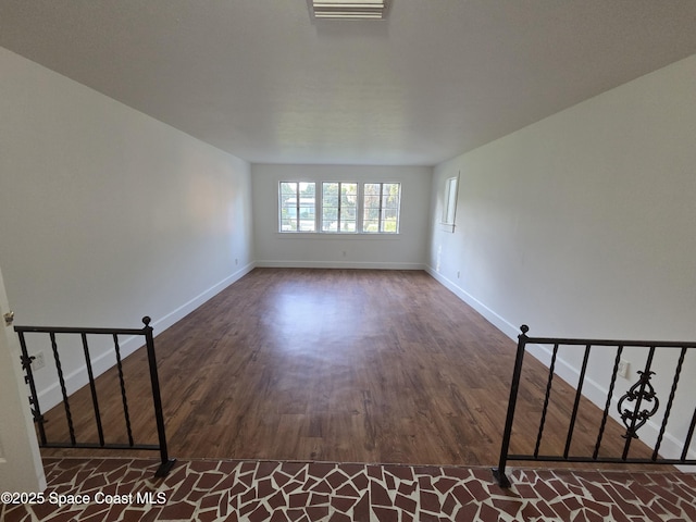 55 S Grandview Cir, Cocoa, FL 32922 - unfurnished room featuring wood finished floors and baseboards