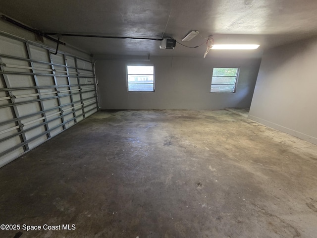 55 S Grandview Cir, Cocoa, FL 32922 - garage featuring a garage door opener