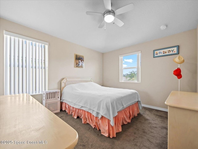 354 Dryden Cir, Cocoa, FL 32926 - bedroom featuring dark colored carpet, baseboards, and a ceiling fan