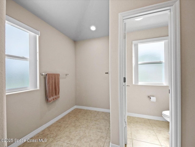 354 Dryden Cir, Cocoa, FL 32926 - bathroom featuring toilet, tile patterned floors, and baseboards