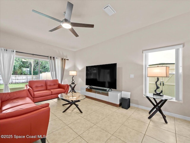 354 Dryden Cir, Cocoa, FL 32926 - living area with ceiling fan, baseboards, and light tile patterned flooring