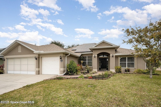 2213 Merlin Dr, Melbourne, FL 32904 - single story home featuring stucco siding, a garage, driveway, a front yard, and solar panels