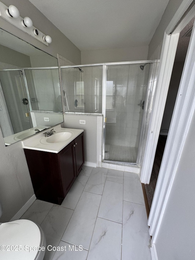 539 Olsmar St SW, Palm Bay, FL 32908 - bathroom with marble finish floors, baseboards, and a stall shower