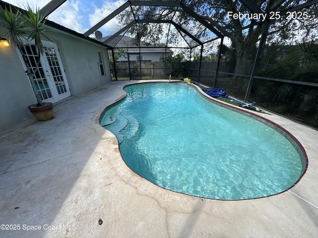 539 Olsmar St SW, Palm Bay, FL 32908 - view of pool with french doors, a patio, glass enclosure, and fence