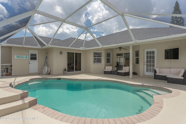 4920 48th Pl, Vero Beach, FL 32967 - outdoor pool with an outdoor living space, a patio area, ceiling fan, and glass enclosure